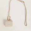 Worn white AirPod case