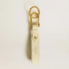 Worn white keyring