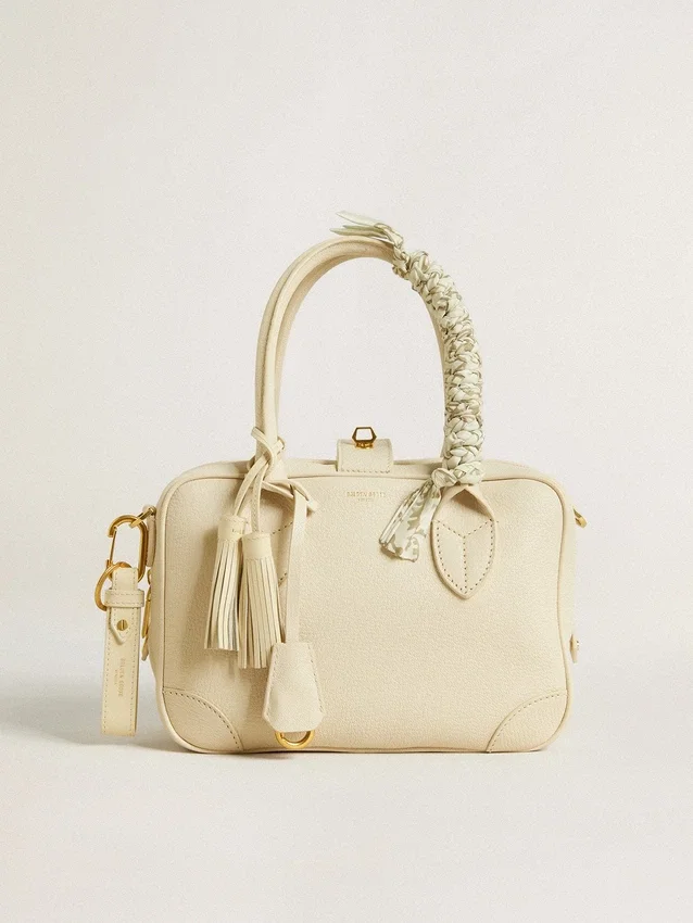 Worn white keyring