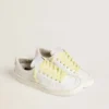 Yellow cotton laces with contrasting gold-colored logo