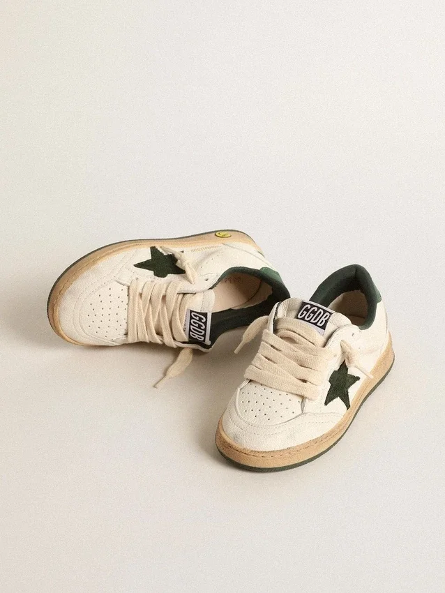 Young Ball Star in white leather with green suede star