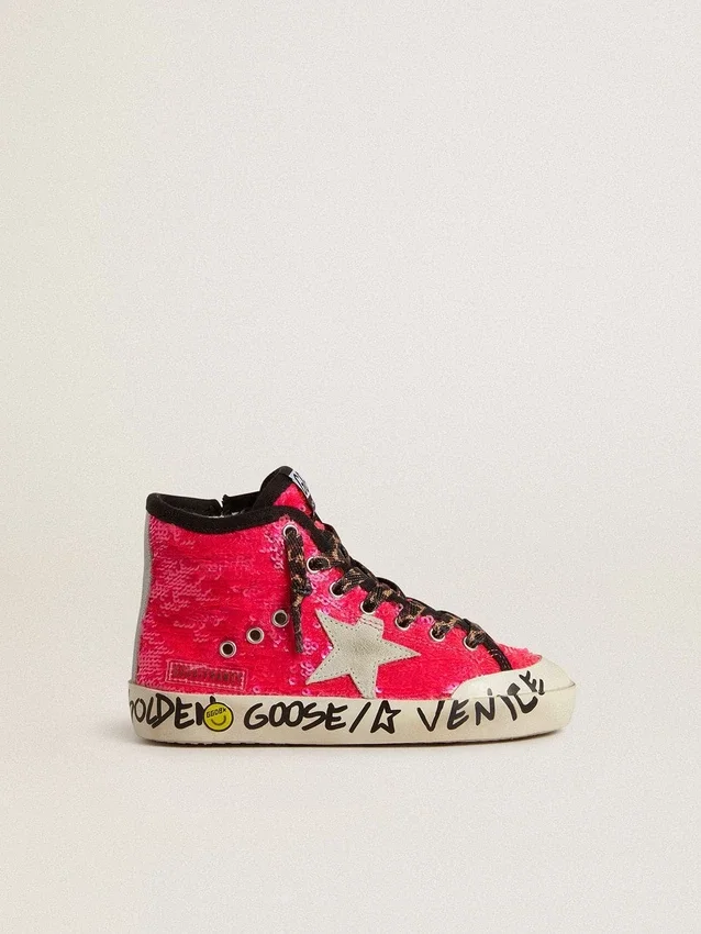 Young Francy in sequins with ice-gray suede star and animal-print laces