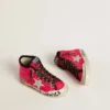 Young Francy in sequins with ice-gray suede star and animal-print laces
