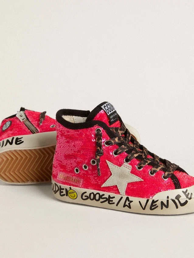 Young Francy in sequins with ice-gray suede star and animal-print laces