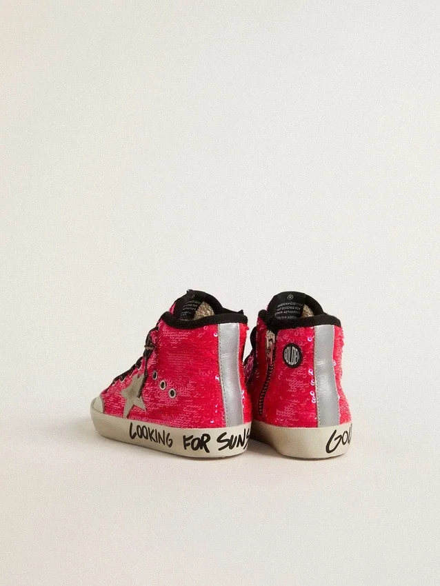 Young Francy in sequins with ice-gray suede star and animal-print laces