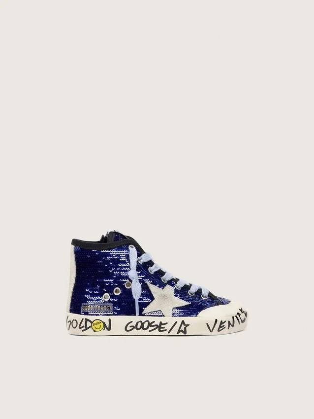 Junior Francy Penstar in blue sequins with white suede star