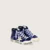 Junior Francy Penstar in blue sequins with white suede star