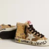 Young Francy Penstar in gold sequins with ice-gray suede star