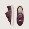 Young Old School in burgundy glitter with burgundy suede star and heel tab