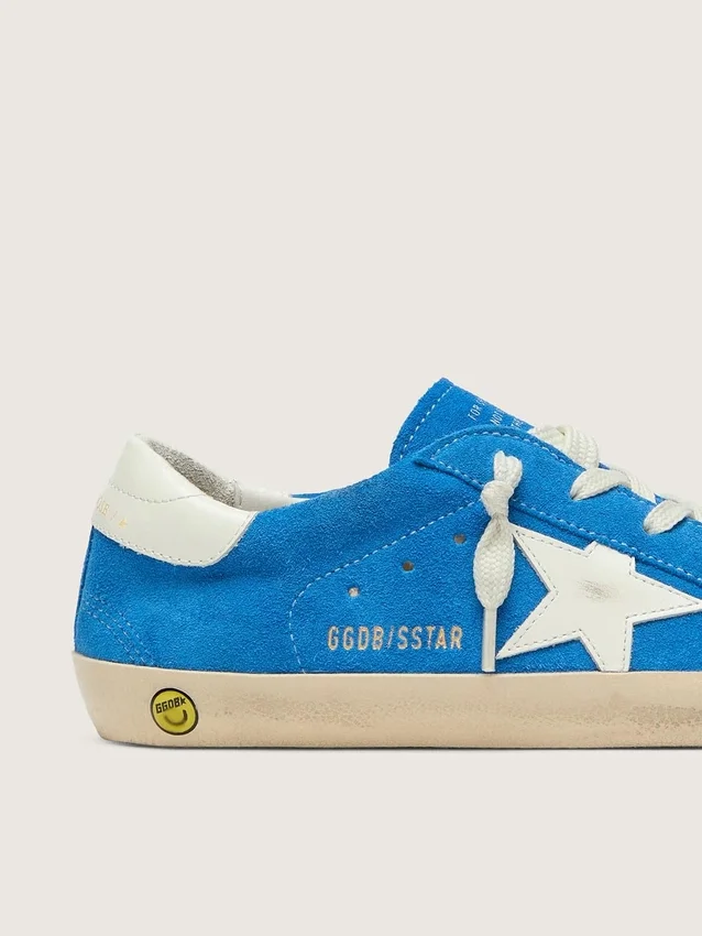 Young Super-Star in bright blue suede with white leather star