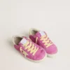 Young Super-Star in pink suede with light yellow star and heel tab