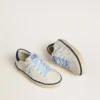 Young Super-Star in white leather with blue suede heel tab