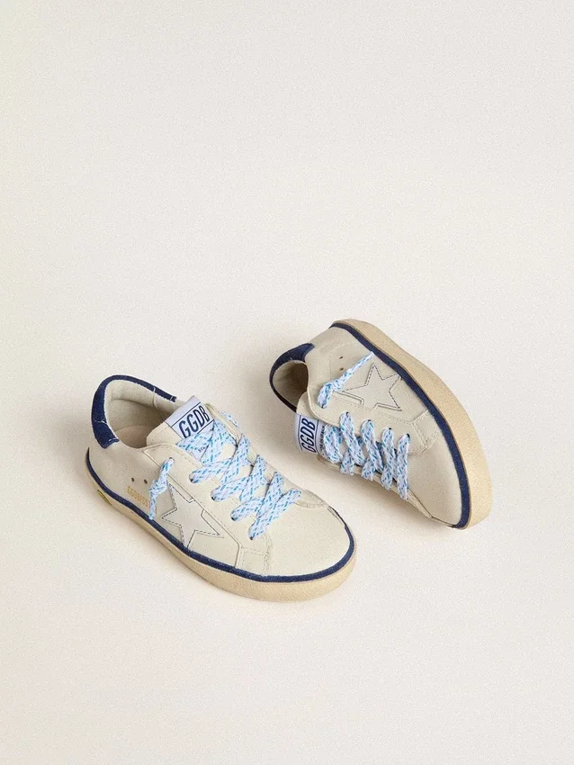 Young Super-Star in white leather with blue suede heel tab