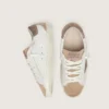 Junior Super-Star in white leather with dark gray suede star and beige suede inserts